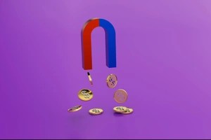 Magnet attracting coins